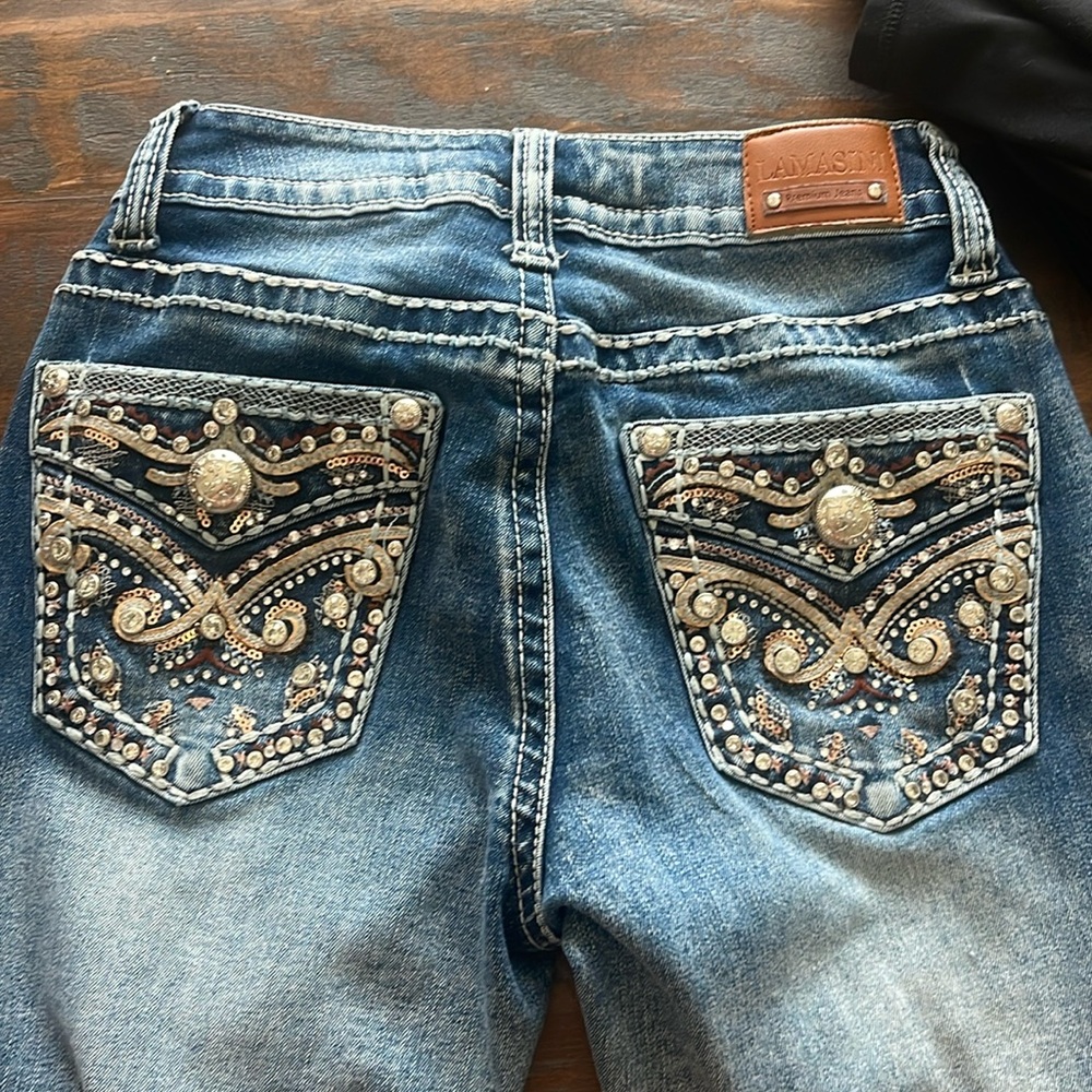 Dark jeans , rhinestone